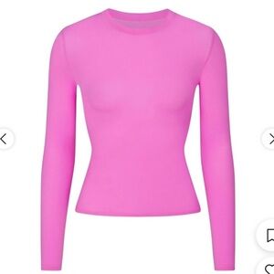 Skims long sleeve pink top